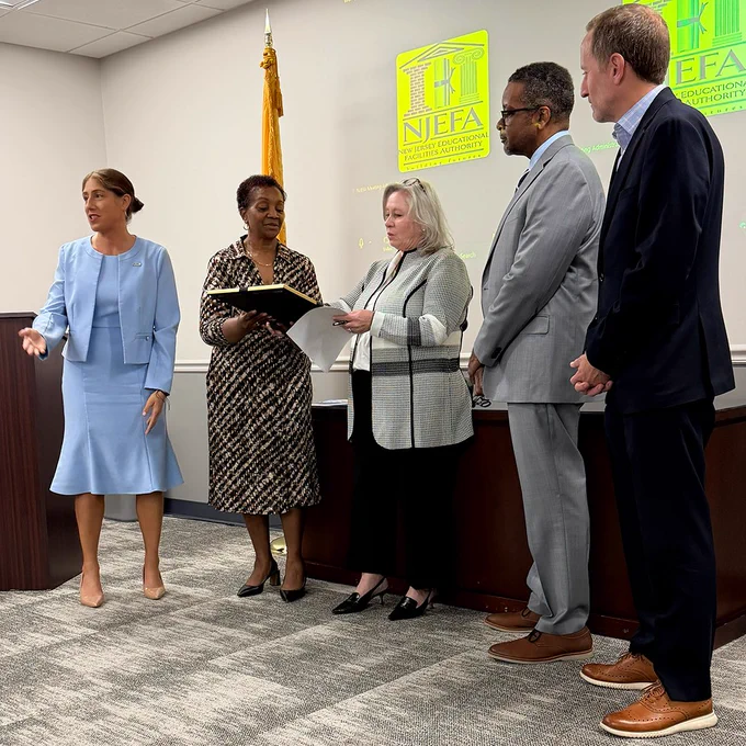 Acting Secretary Margo Chaly and Assistant Secretary/CFO Angela Bethea present NJEFA leadership with a commemorative letter celebrating the Authority's 60th anniversary.