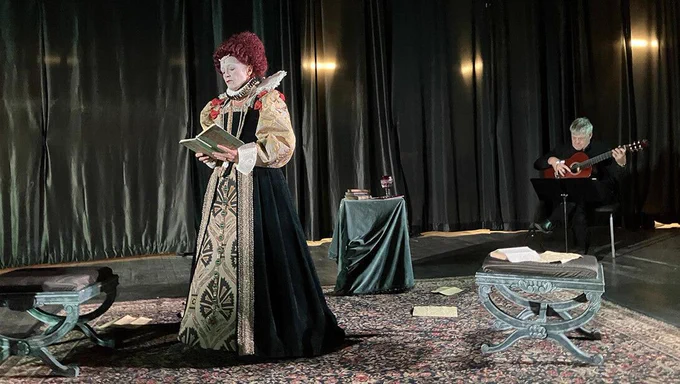 Tamara Meneghini and Rick Pruitt performing the play "Elizabeth I: In Her Own Words"