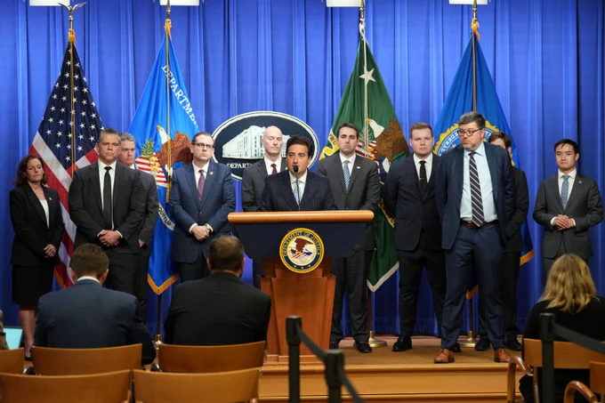 Acting Assistant Attorney General Omeed A. Assefi of the Justice Department’s Antitrust Division delivers remarks during a press conference.