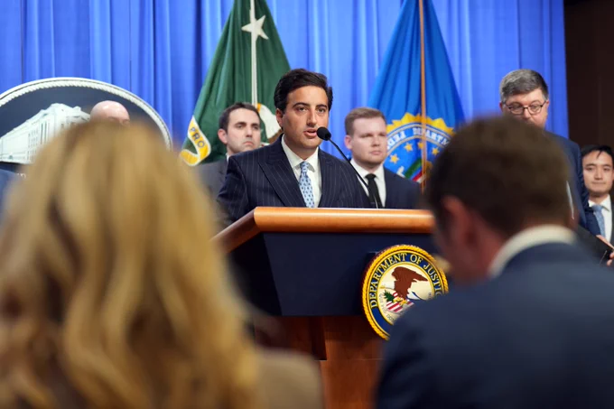 Acting Assistant Attorney General Omeed A. Assefi of the Justice Department’s Antitrust Division delivers remarks during a press conference.