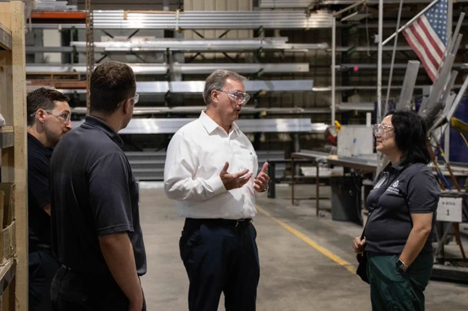 Craftsman CEO and owner Mark Steele leads tour group around his facility. Pictured: St. Charles Fire Chief Joe Gragnani, Division of Labor Standards Director Logan Hobbs, and Director Anna Hui