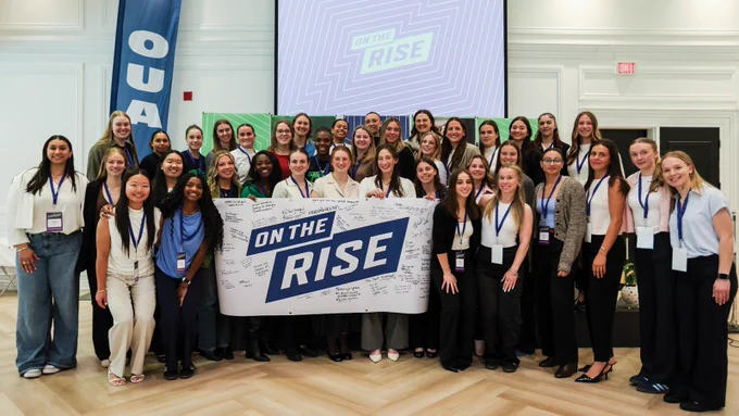 Large group photo of the first class of student-athletes apart of the women in sport summit