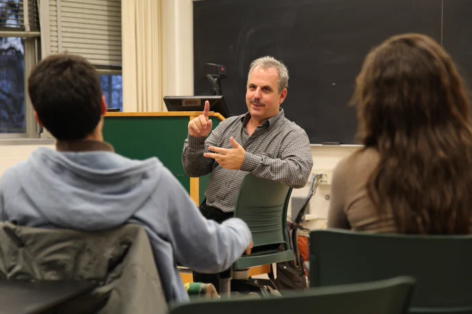 Bill Mechanic talking to students in an MSU classroom