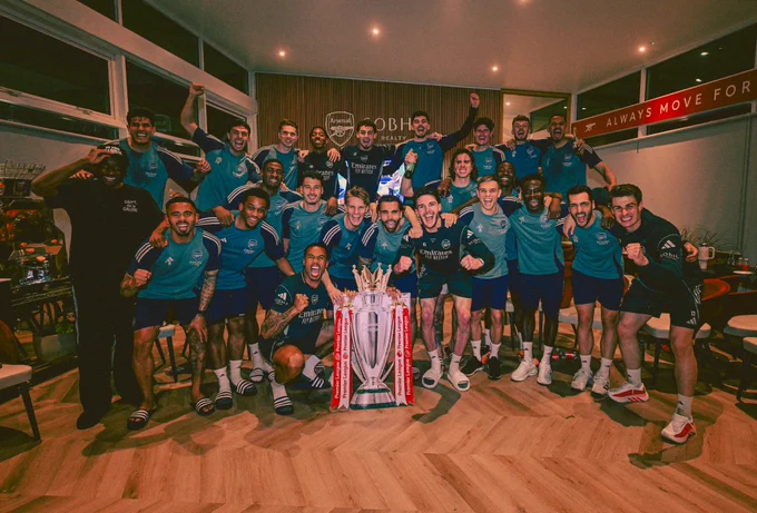 The Arsenal players celebrate our fourth Premier League title.