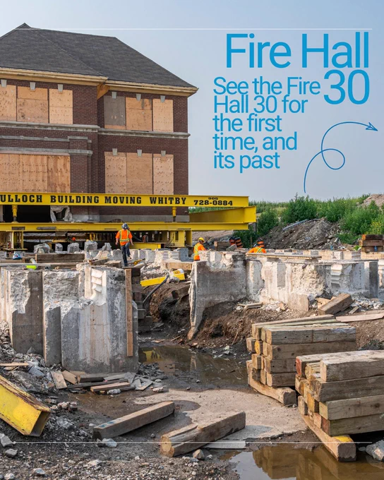 A building under construction with two workers on-site, surrounded by wooden beams and construction materials. The building is on a structure labeled "McCulloch Building Moving Whitby." Text reads: "Fire Hall 30. See the Fire Hall 30 for the first time, and its past."