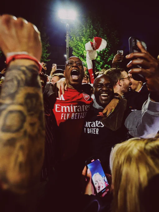 Ian Wright with supporters outside Emirates Stadium.