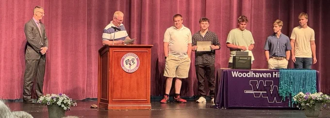 DCTC students on stage winning awards 