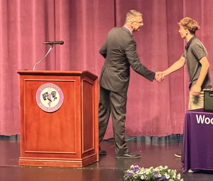 DCTC students on stage winning awards 