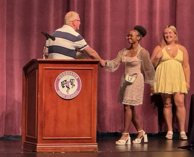 DCTC students on stage winning awards 