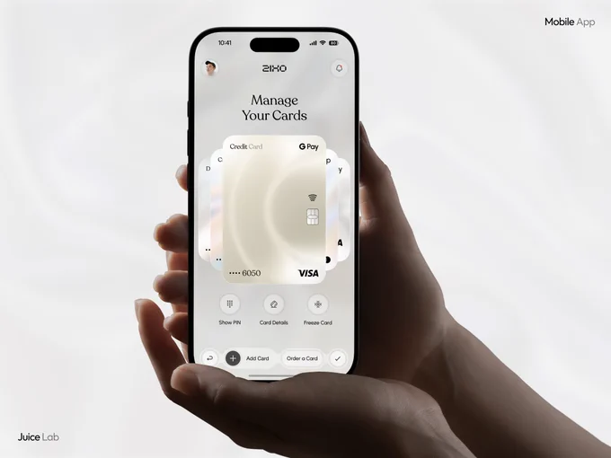 Lifestyle shot of a hand holding a smartphone displaying ZIKO fintech app's "Manage Your Cards" screen. Shows Credit Card and G Pay cards with Visa branding, quick actions including Show PIN, Card Details, Freeze Card, Add Card, and Order a Card. Elegant, modern, and premium card management interface designed by Juice Lab.