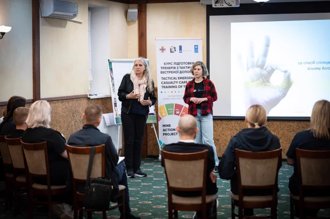 Instructors lead a classroom session on tactical emergency casualty care for participants of the Training of Trainers course supported by UNDP and the Kingdom of the Netherlands