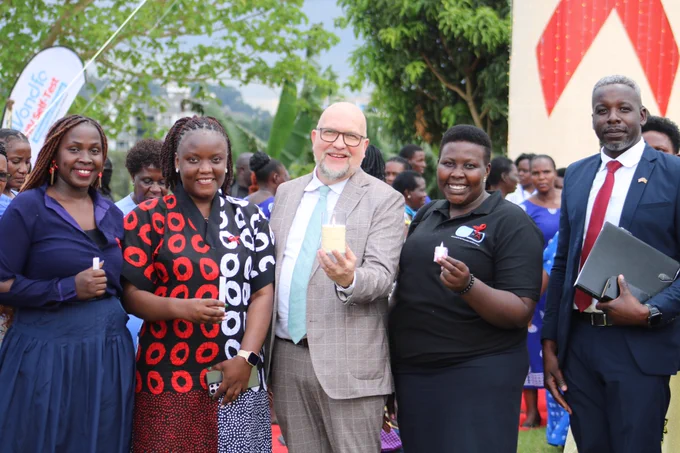 U.S. Embassy Uganda DCM Cleverly standing in solidarity with patrons at the international candlelight memorial
