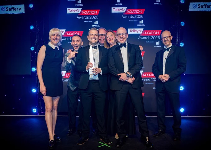 Recap staff and friends accepting the award, London, May 2026