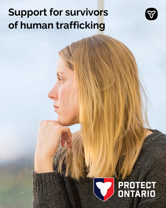 Young woman gazing out window; text reads "Support for survivors of human trafficking"