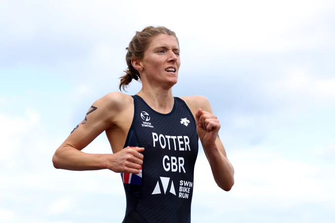 Beth Potter running. The photo is taken from the waist up and she is wearing her GB tri suit