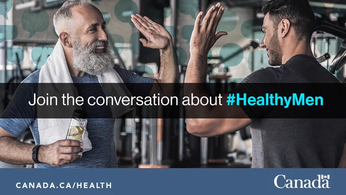 Two men high-fiving each other at the gym. Image text:  Join the conversation about #HealthyMen
