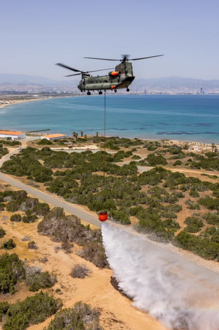 RAF 1310 Flight (Flt) Chinook caries out a practise drop, using a firefighting bucket at the start of Wildfire season in Cyprus.