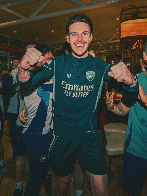 An image of Declan Rice celebrating after winning the Premier League.