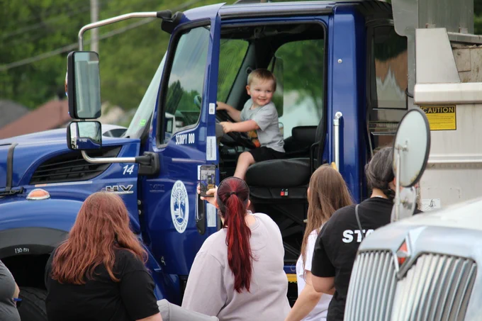 child in truck