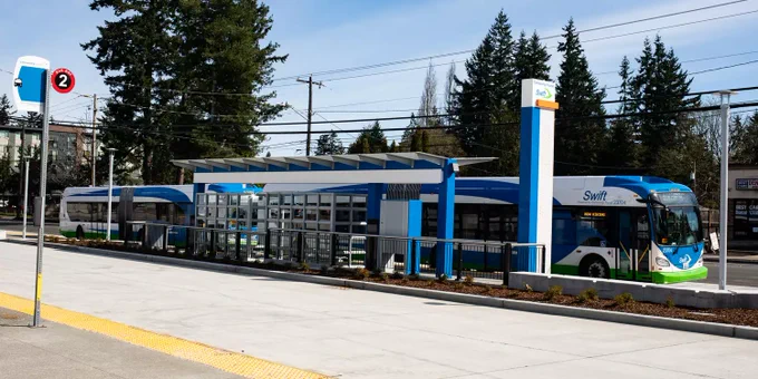 A Community Transit Swift Line bus at a station. 