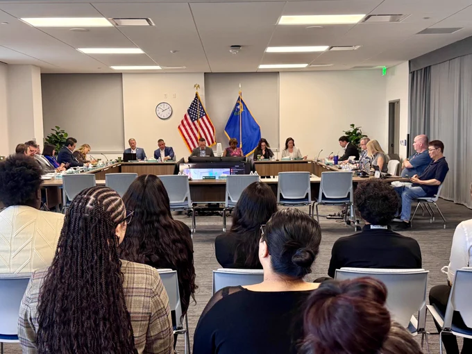 WC board meeting wide shot 