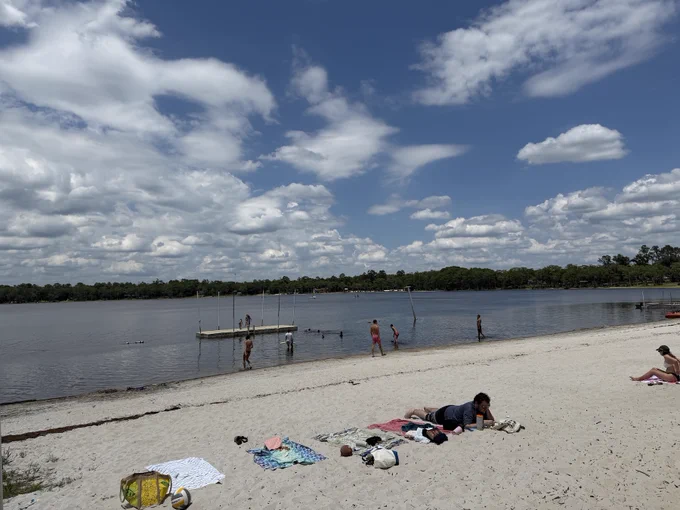 A wide shot of the beach at FSU's Lakefront Park and Retreat Center.