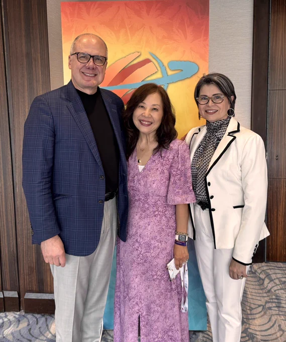 3 people smiling