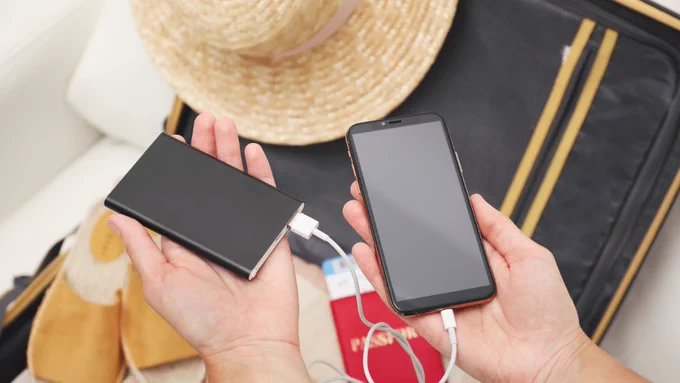 Passenger charging phone with portable charger