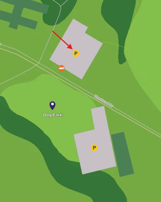 Map showing two parking areas marked with 'P' near the dog park along Umstead Drive.