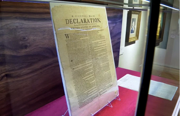 A copy of the Declaration of Independence, printed by Robert Luist Fowle in July 1776, sits on display at Christie's during a preview for the "We the People: America at 250" auction, Jan. 15, 2026 in New York. Joe Frederick, Associated Press.