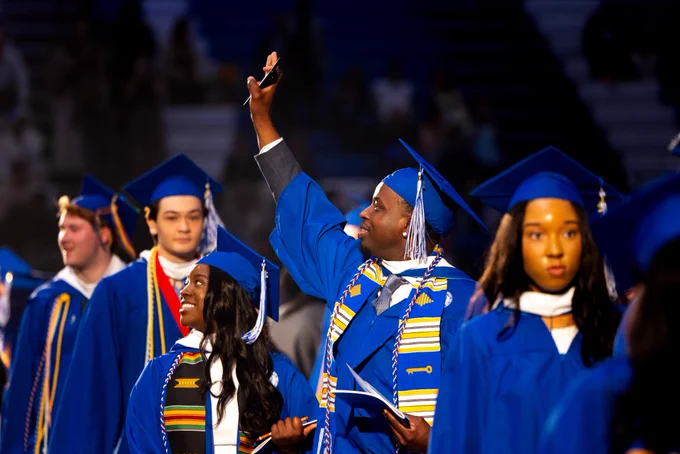 Graduates attend commencement activities. 