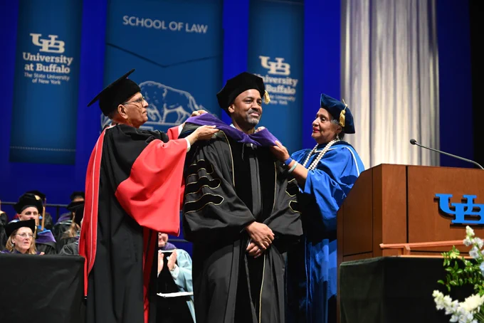 UB alumnus Jonathan Beane receives a SUNY Honorary Degree at the School of Law commencement. 