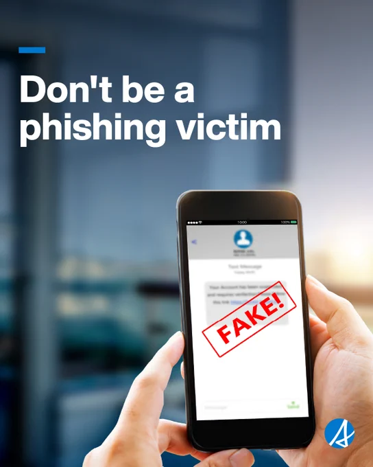 Person's hands holding a smart phone displaying a text message. Image stamped in red saying FAKE. Headline reads Don't be a phishing victim. 