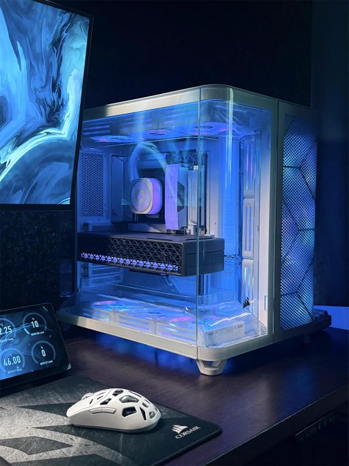 An image of a CORSAIR Air 5400 build.  The color scheme is a soft, hazy blue to contrast the white case, giving a dreamy aesthetic. 