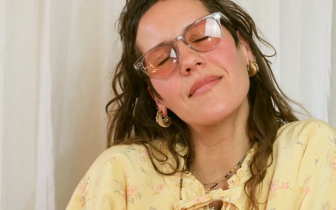 Model wearing tinted glasses