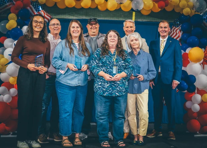 A group photo of the ETSU Staff Senate award winners with President Dr. Brian Noland and Howard Reddy.