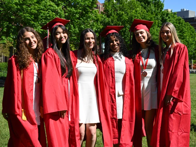 DHS students posing in their caps and gowns