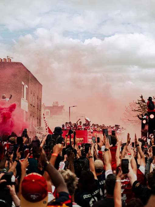 Creators Club photography of Arsenal's bus during the parade