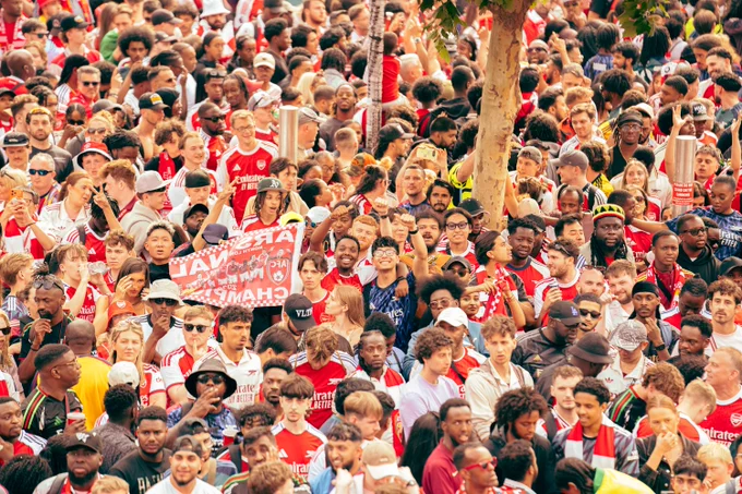 Creators Club photography of Arsenal supporters during the parade