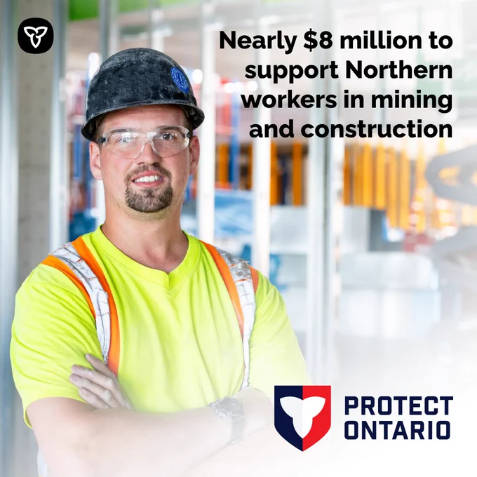 Construction worker with their arms crossed