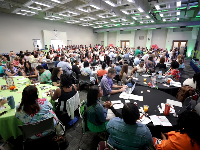 Room full of educators at EPIC 2026 retreat.