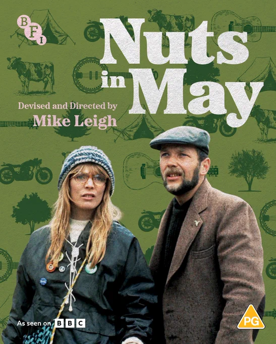 Blu-ray cover for Nuts in May showing two people outdoors, dressed in coats and hats. The green background includes illustrations of animals, bicycles and tents. In the top left corner is a BFI logo and yellow PG triangle in the bottom right corner. 