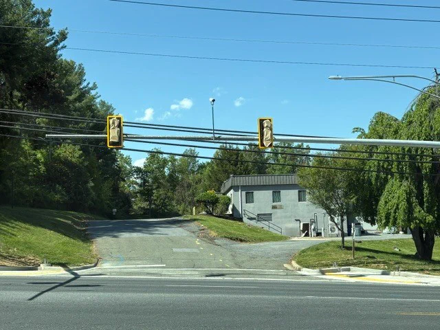 New traffic signal with bags over the lenses.