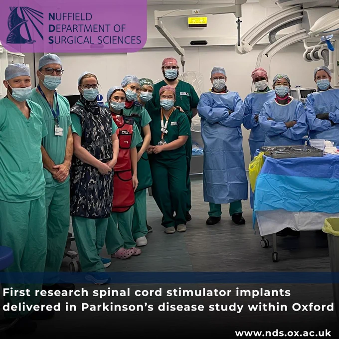 NDS logo, picture of the research neurosurgery operating team in the Acute Multidisciplinary Imaging and Intervention Centre (AMIIC), Txet that reads: First research spinal cord stimulator implants delivered in Parkinson’s disease study within Oxford, www.nds.ox.ac.uk