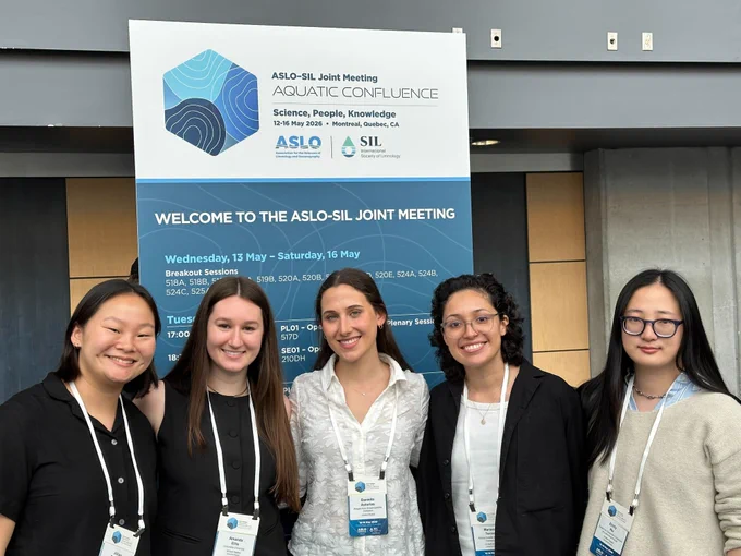 The 2024-2026 cohort of C-CoMP Bridge-to-PhD Fellows take a group picture at the ASLO-SIL Joint Meeting in May 2026. Photo credit: Victoria Centurino, WHOI.