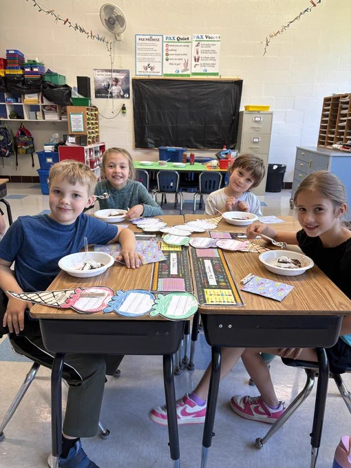 Normandy first-graders enjoy ice cream day in their classroom.