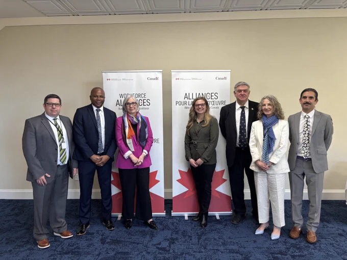 Group photo of Minister Hajdu with event participants. 