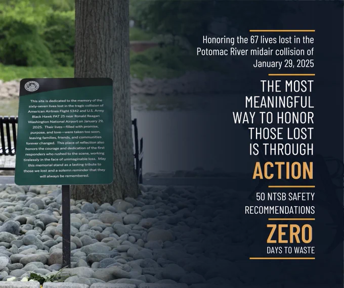 A memorial stands outdoors, surrounded by stones. It has a plaque with a dedication to those lost in the Potomac River midair collision of January 29, 2025. Adjacent text reads: "Honoring the 67 lives lost" and emphasizes "The most meaningful way to honor those lost is through action." It highlights "50 NTSB safety recommendations" with "zero days to waste.