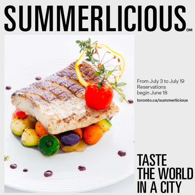 Grilled fish fillet served on a bed of colorful roasted vegetables, garnished with a cherry tomato, lemon slice, and fresh herbs on a white plate.