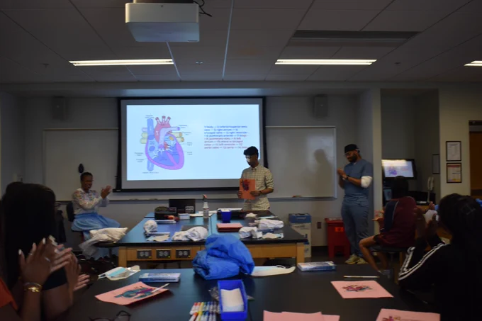 Photo of students enjoying learning about the cardiovascular system.